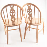 Pair of Ercol fleur-de-lis Windsor 2056 chairs