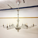 A stunning 12 branch venetian art deco chandelier, these amazing chandelier is made out of crystal glass and really reflects the light when it's on. Measurements: Height 100cm, Width 128cm, Depth 100cm. 