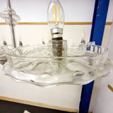 . The chandelier is working and looks even better, in person. Delivery can be arranged, either packed safely dismantled for easier transport. Or a large crate can be made with loots of padding for complete chandelier transportation which will cost alot more due to size and materials involved.