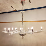 A stunning 12 branch venetian art deco chandelier, these amazing chandelier is made out of crystal glass and really reflects the light when it's on. Twelve art deco crystal glass dishes, that sit on various lengths of crystal glass arms. Giving the chandelier a sunburst look from the underneath. 