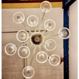 Giving the chandelier a sunburst look from the underneath