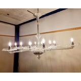 A stunning 12 branch venetian art deco chandelier, these amazing chandelier is made out of crystal glass and really reflects the light when it's on. Twelve art deco crystal glass dishes, that sit on various lengths of crystal glass arms. Giving the chandelier a sunburst look from the underneath Measurements: Height 100cm, Width 128cm, Depth 100cm.