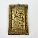 Antique Brass Plaque depicting a Boy in Foliage