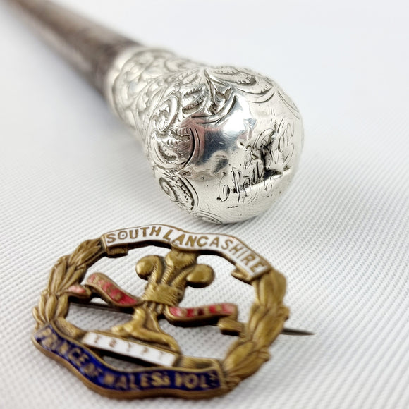 Silver Topped Swagger Stick and South Lancanshire brooch