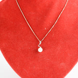 Silver and Faux Pearl Necklace