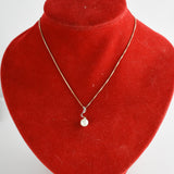 Silver and Faux Pearl Necklace