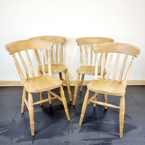 Set of Four elm farmhouse chairs all have signs of being used with the odd marks on each chair. All four chairs are strong and sturdy ready to be used straight away. They could do with a little tlc but are great chairs.  Measures: Height 86.5cm, Width 52cm, Depth 51cm, seat height 47.5cm.