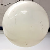 Pair of vintage industrial lights with Cast iron light fixing and a perspex ball shape shade. These have a great industrial look and style to them showing signs of wear with Scuffs and scraps to the shade of each light shade. Both lights in working order and look great hung up and lit up.   Measures: Height 60cm, Diameter approximately 36cm.