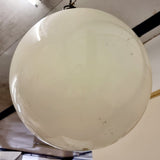 Pair of vintage industrial lights with Cast iron light fixing and a perspex ball shape shade. These have a great industrial look and style to them showing signs of wear with Scuffs and scraps to the shade of each light shade. Both lights in working order and look great hung up and lit up.   Measures: Height 60cm, Diameter approximately 36cm.