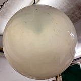 Pair of vintage industrial lights with Cast iron light fixing and a perspex ball shape shade. These have a great industrial look and style to them showing signs of wear with Scuffs and scraps to the shade of each light shade. Both lights in working order and look great hung up and lit up.   Measures: Height 60cm, Diameter approximately 36cm.