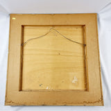 1975 mixed media by Howard. An eye catching 1970s mixed media painting on board, which is then fixed to a hessian cover wooden board to a grey frame. Signed lower left corner Howard 75. Howard has used different materials as well as painting this unique piece of artwork. Back of painting frame good condiiton   Measures: Height 56.3cm, Width 55.8cm, Depth 5cm