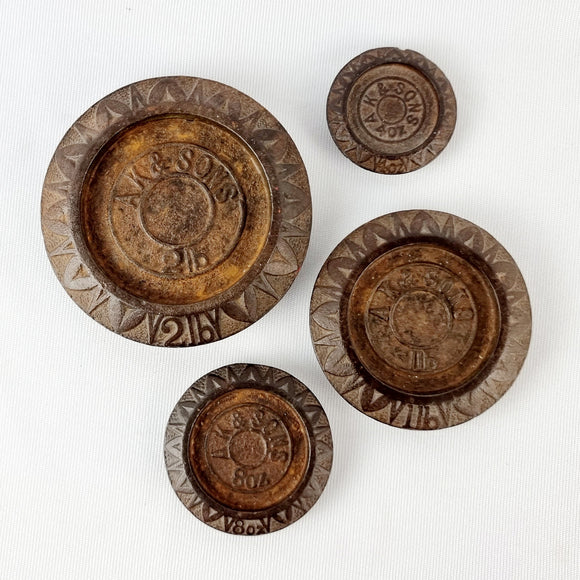 Set of Four AK and Sons Cast Iron Weights