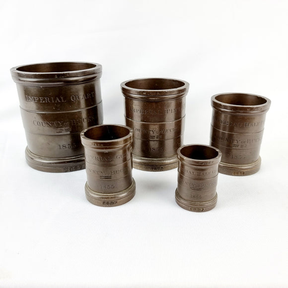 Set of Five Victorian Imperial Bronze Measures.